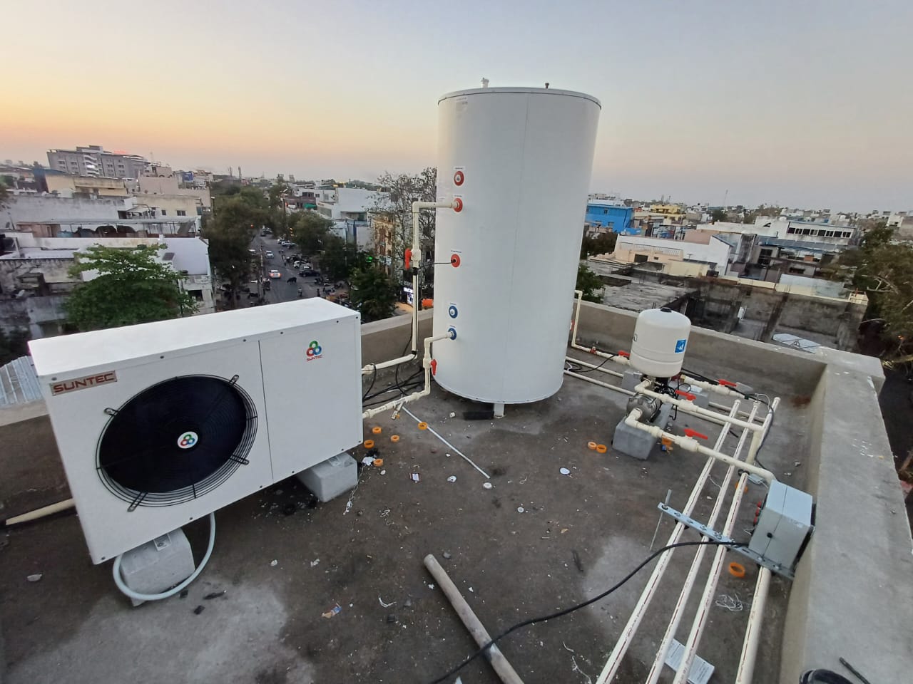 Rooftop commercial hotel heat pump water heater installation with storage tank